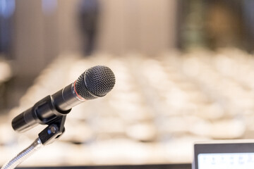 Close up of microphone on a podium in an auditorium