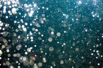Abstract white bokeh with black background