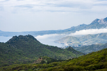 View of the Crimean Mountains and the town of Koktebel in the Black Sea bay