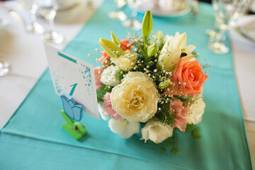 people having a wedding with flowers and details