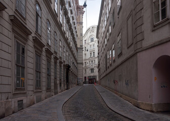 Fototapeta na wymiar Narrow street in Vienna, Austria