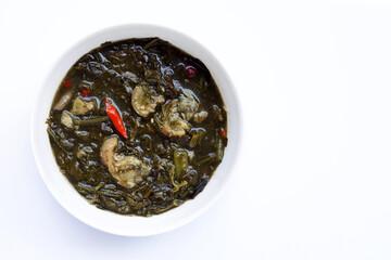 Cassia curry with pork on white background.