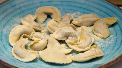 A kind of ravioli, casoncelli, home made traditional food of the Bergamo area, Italy. Delicious Italian food. Ravioli on plate