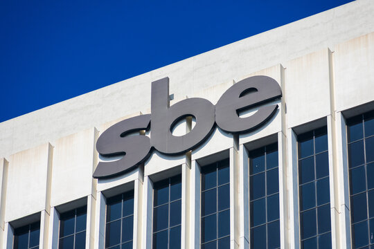 SBE sign logo above headquarters building of SBE Entertainment Group. SBE is a privately held, lifestyle hospitality company - Los Angeles, California, USA - 2020
