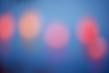 Blurred colorful bokeh lights in the night