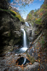 Fotinovo waterfalls (Fotinski waterfall) in Rhodopes Mountain, Pazardzhik region, Bulgaria. Amazing autumn landscape