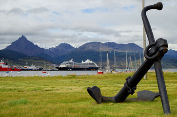 Modern cruise ship, cruiseship liner or expedition vessel ship in port of Ushuaia, Argentina with...