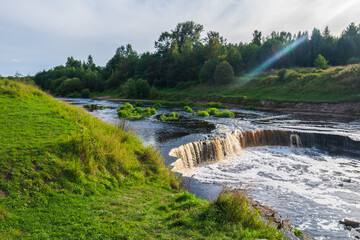 Fototapeta premium The coast of a small river, large stones.