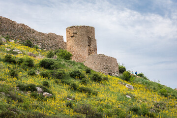 Fototapeta premium Tower and wall of ancient Genoese fortress Cembalo built around 1343 near the modern city of Balaklava on the Crimean Peninsula