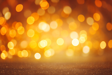 Defocused golden Christmas bokeh background. Sparkle abstract shiny festive texture.