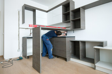 Installing kitchen furniture in a new small apartment