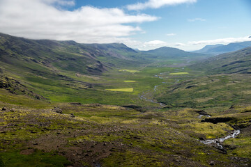 Majestic volcanic landscape covered with moss in Iceland highlands