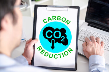 Carbon reduction concept on a clipboard