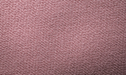 Pink textile abstract background. Close up 