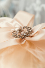 decorative bow on gift box isolated. decorative brooch