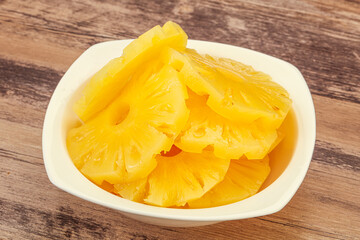 Marinated pineapple rings in the bowl