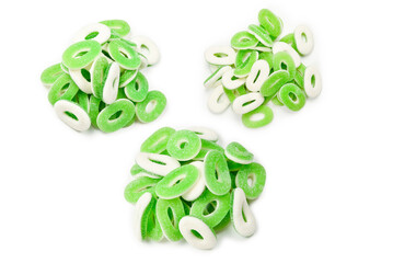 Green gummy candies rings isolated on white. Top view. Jelly  sweets.