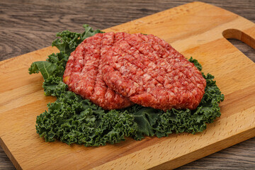 Raw beef burger cutlet for cooking
