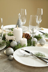Concept of romantic New year table setting on gray table