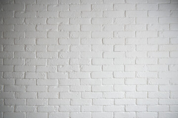 Modern white brick wall texture with light and shadow for background