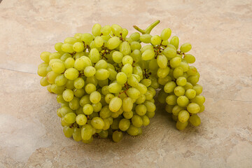 Green grape branch over background