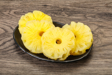 Sweet pineapple rings in the bowl