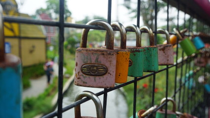 Old padlock on the fence