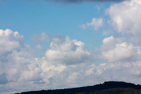 White clouds cumulus floating on blue sky for backgrounds concept © Seluk