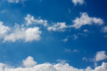 White clouds cumulus floating on blue sky for backgrounds concept