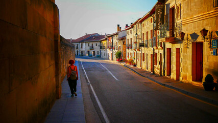 SANTO DOMINGO DE SILOS, SPAIN - Sep 10, 2019: Woman exploring a town