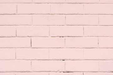 Pink textured brick wall background