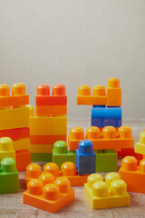 Set of different children's toys on a colored background. A place to insert text, minimalism. Baby background.