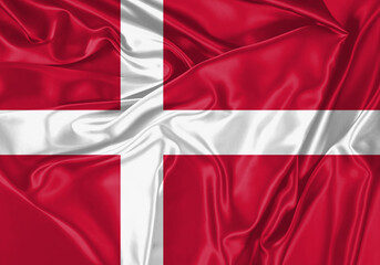 Denmark flag waving in the wind. National flag on satin cloth surface texture. Background for international concept.