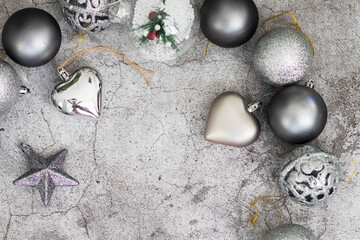 Fototapeta na wymiar new year toys on gray background