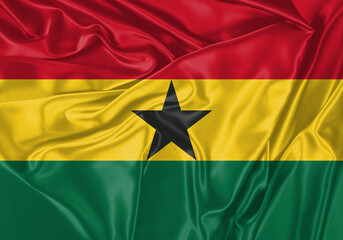 Ghana flag waving in the wind. National flag on satin cloth surface texture. Background for international concept.