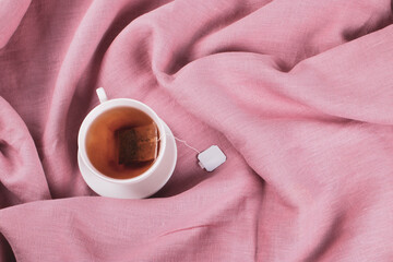 tea cup on linen textile