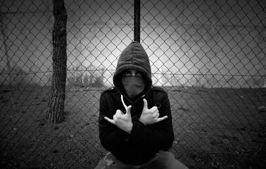 Young criminal protester lockdown