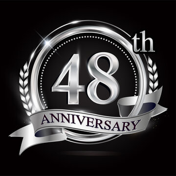 Celebrating 48th anniversary logo, with silver ring and ribbon.
