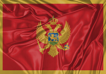 Montenegro flag waving in the wind. National flag on satin cloth surface texture. Background for international concept.