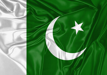 Pakistan flag waving in the wind. National flag on satin cloth surface texture. Background for international concept.