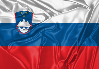 Fototapeta premium Slovenia flag waving in the wind. National flag on satin cloth surface texture. Background for international concept.