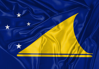 Tokelau flag waving in the wind. National flag on satin cloth surface texture. Background for international concept.