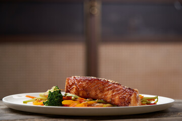 Teriyaki salmon on white plate. Salmon Teriyaki
