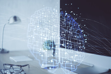 Double exposure of work space with computer and human brain drawing hologram. Brainstorm concept.