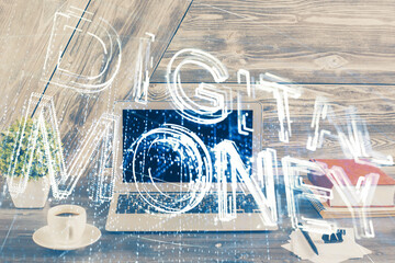 Double exposure of blockchain theme hologram and table with computer background. Concept of bitcoin crypto currency.