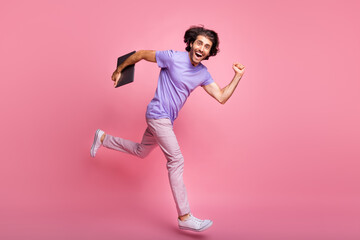 Full size profile side photo of trendy stylish guy jump run sale wear pink pants violet t-shirt...