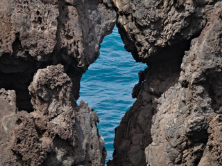 Stone mound with a water background