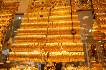 Glamorous golden bracelet selling in grand bazaar market.