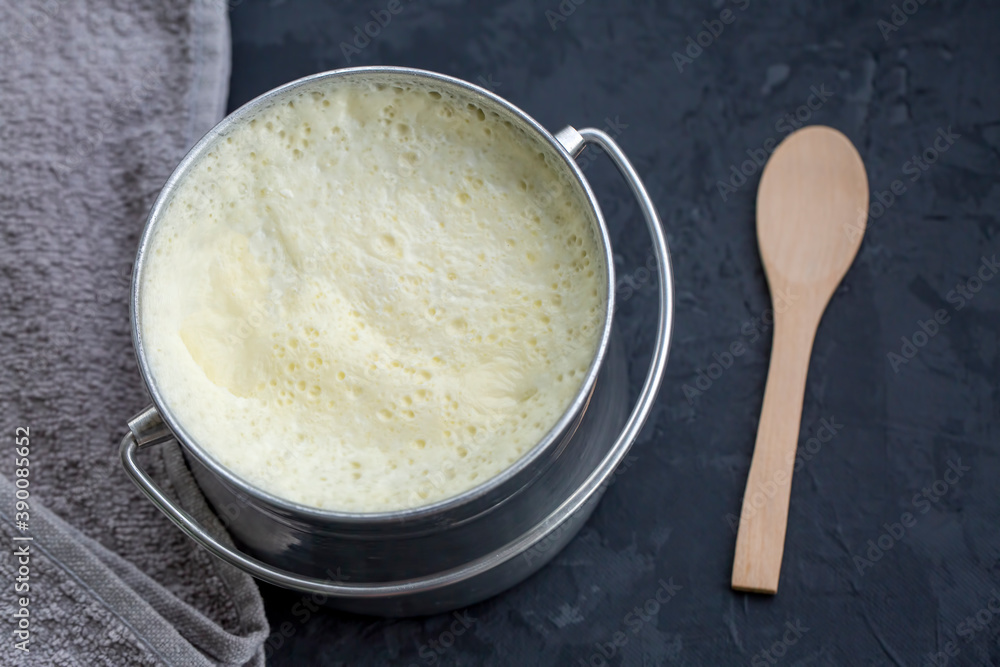 Wall mural Turkish and Greek traditional dairy food yogurt or yoghurt in a pot (Goat yogurt)