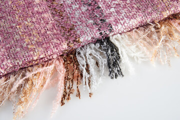 Detail of a Elegant Muliticolored fabric scarf on white background